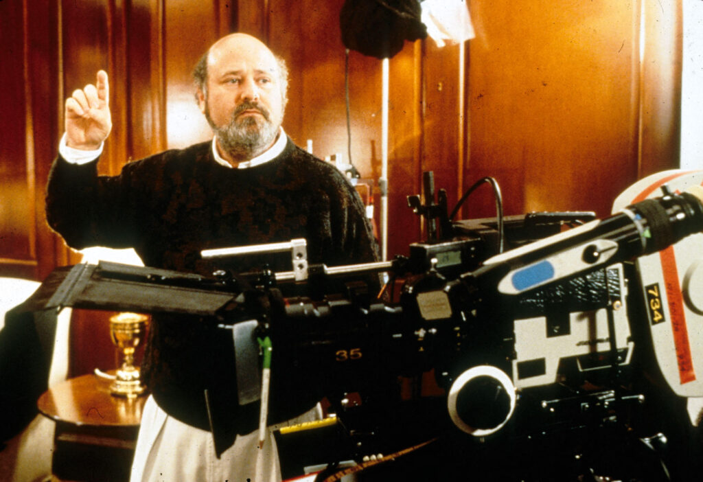 רוב ריינר על סט הצילומים של סרטו "הנשיא מאוהב" (1995)